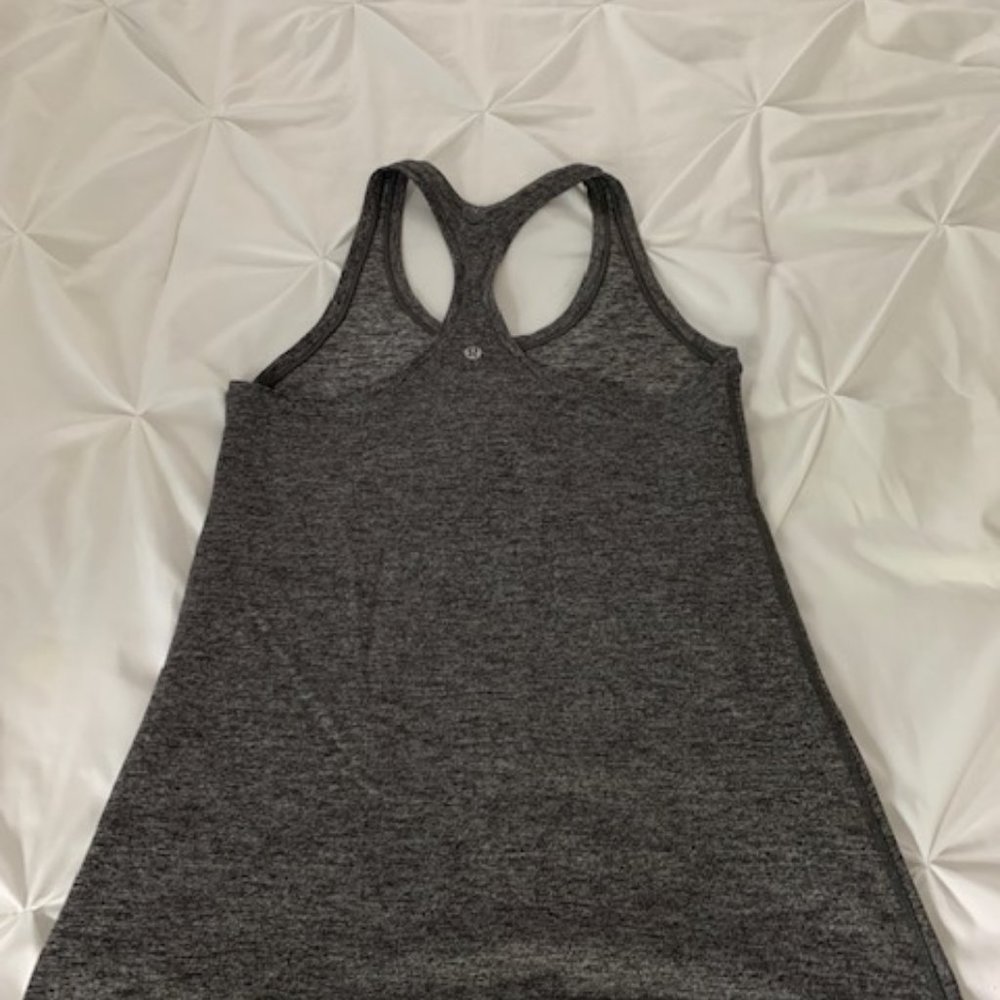 4 tanks: Size 10 Lululemon tank tops